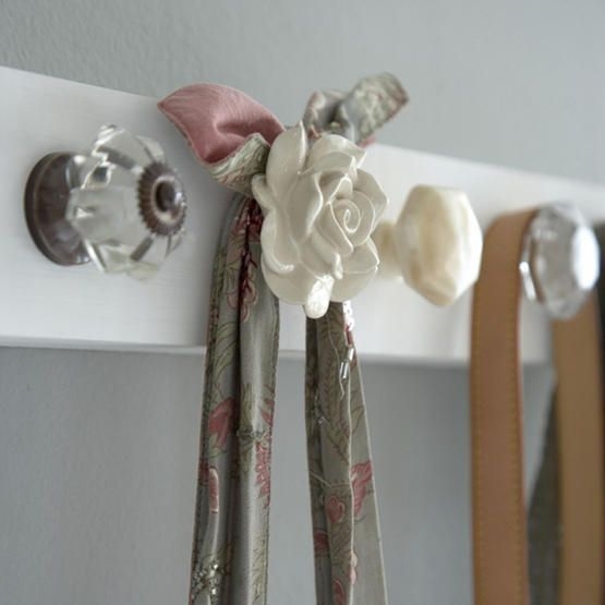 Use antique or vintage door knobs as hooks to hang coats, purses, towels, and more!