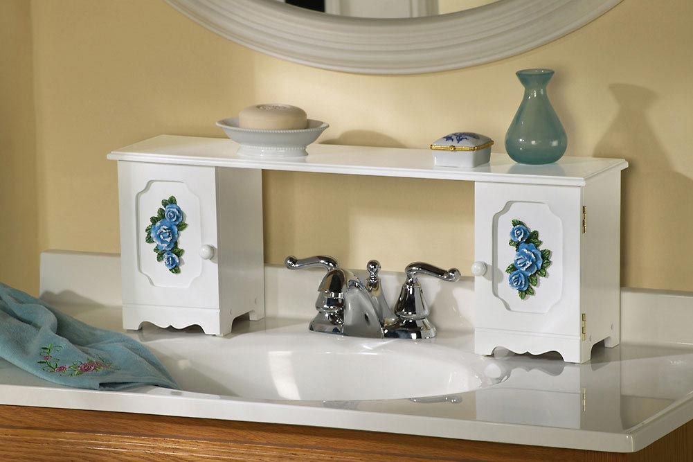 If you have a small sink and counter in your bathroom, expand it by adding an over-the-sink shelf or creating your own movable shelves with spice racks.