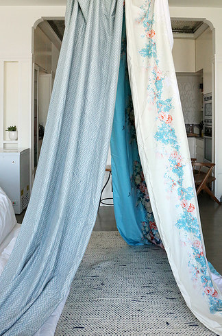 Use towel clips and rubber bands to connect the sheets. Via BuzzFeed.