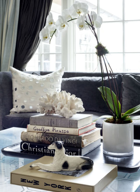 a porcelain animal and coral create a stunning coffee table display