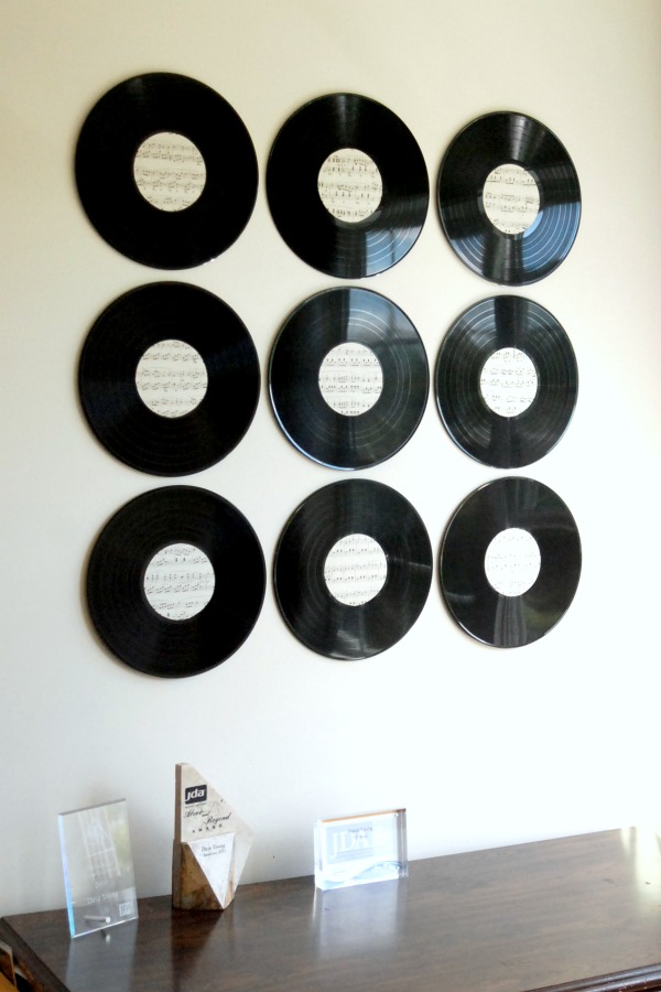 Use old (or fake) vinyl records to create glamorous musical wall art.