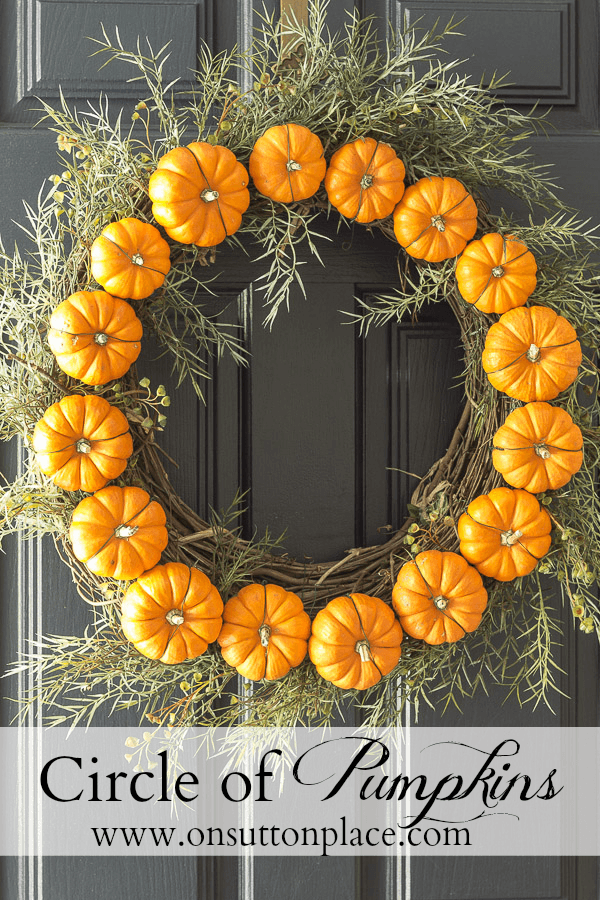 This DIY fall wreath is made from pumpkins!