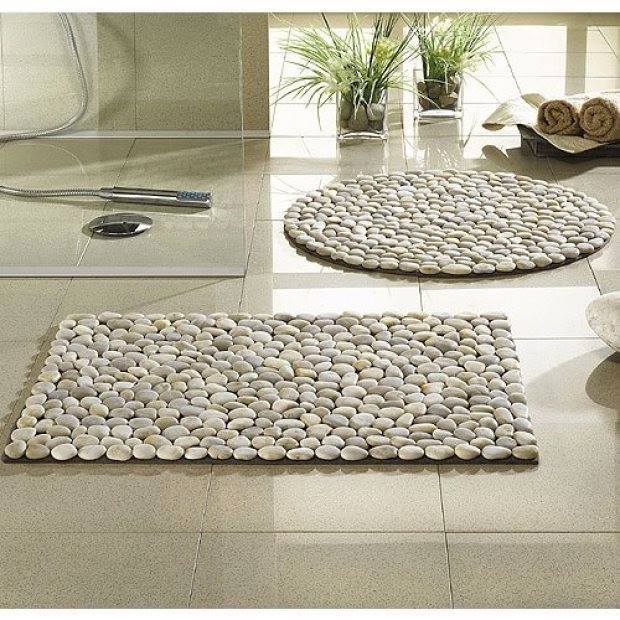 Use smooth river pebbles to create a spa-like bath mat for your bathroom.