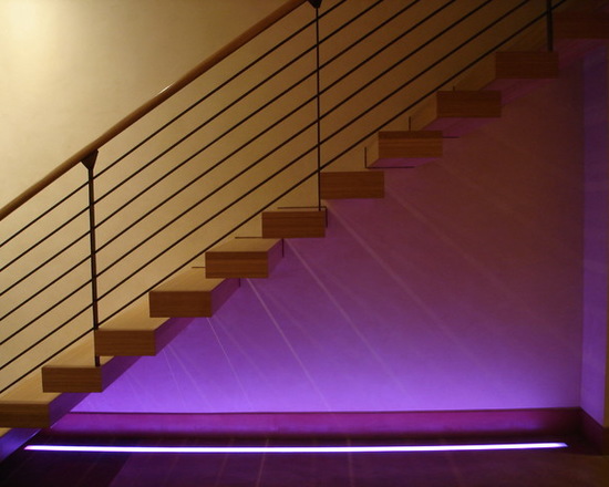 Instead of lighting up each step individually, light up your entire staircase for some beautiful ambient lighting.