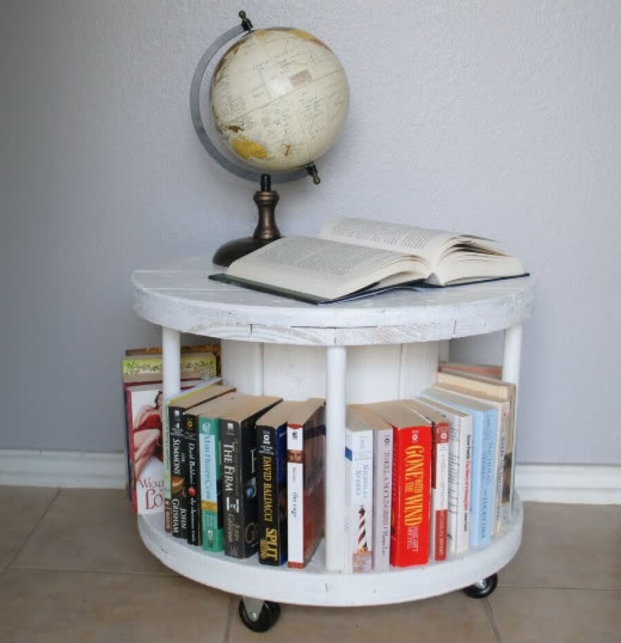 A DIY bookshelf made from a cable spool