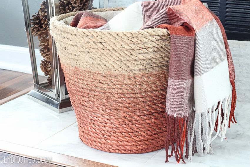 This DIY ombre rope basket is perfect for holding extra blankets!