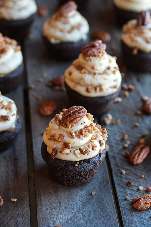Add a pecan on top to create the culinary masterpiece that is bourbon cupcakes