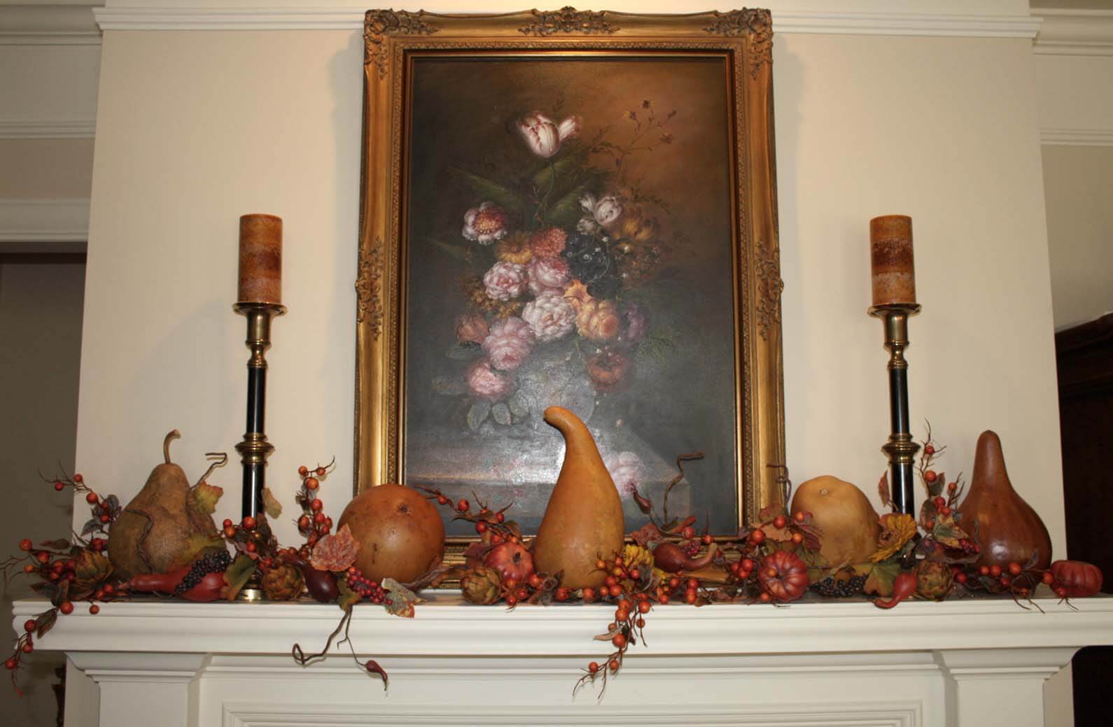 Use gourds as Fall DIY decor on a fireplace mantle in your home's interior.