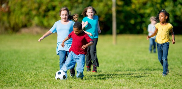 Plan a sports day for your kids to keep them entertained during the summer.