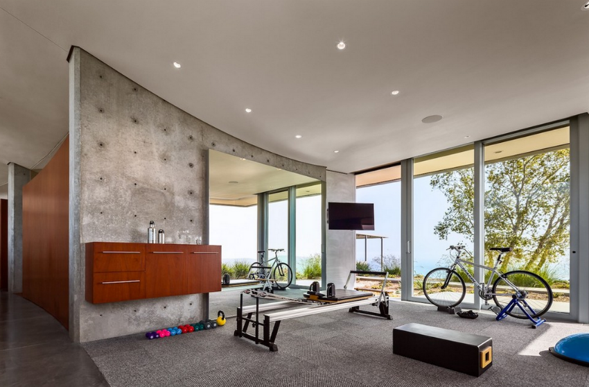This contemporary style home gym looks great! Image Source: Homes of the Rich