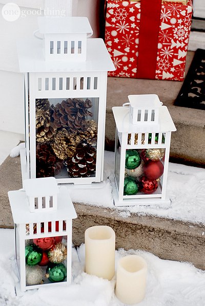 Put ornaments or pinecones in lanterns for quick and easy decorations for your front steps!