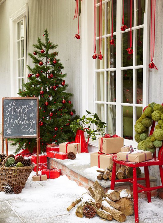 Adding an extra Christmas tree to your front porch will surely welcome in the season!