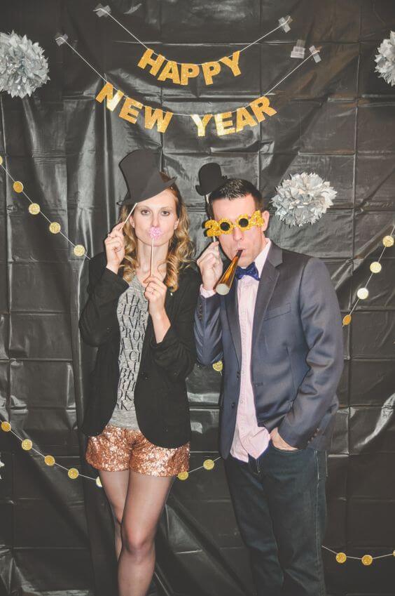 DIY Photo booths are a great addition to any New Year's Eve party!