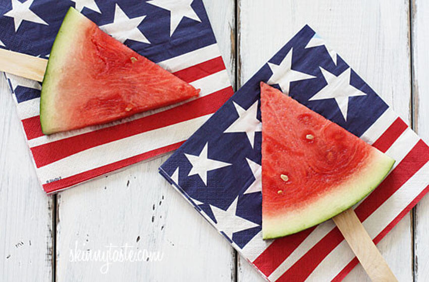 Putting watermelon on a stick is a genius way to eat the fruit without getting messy!