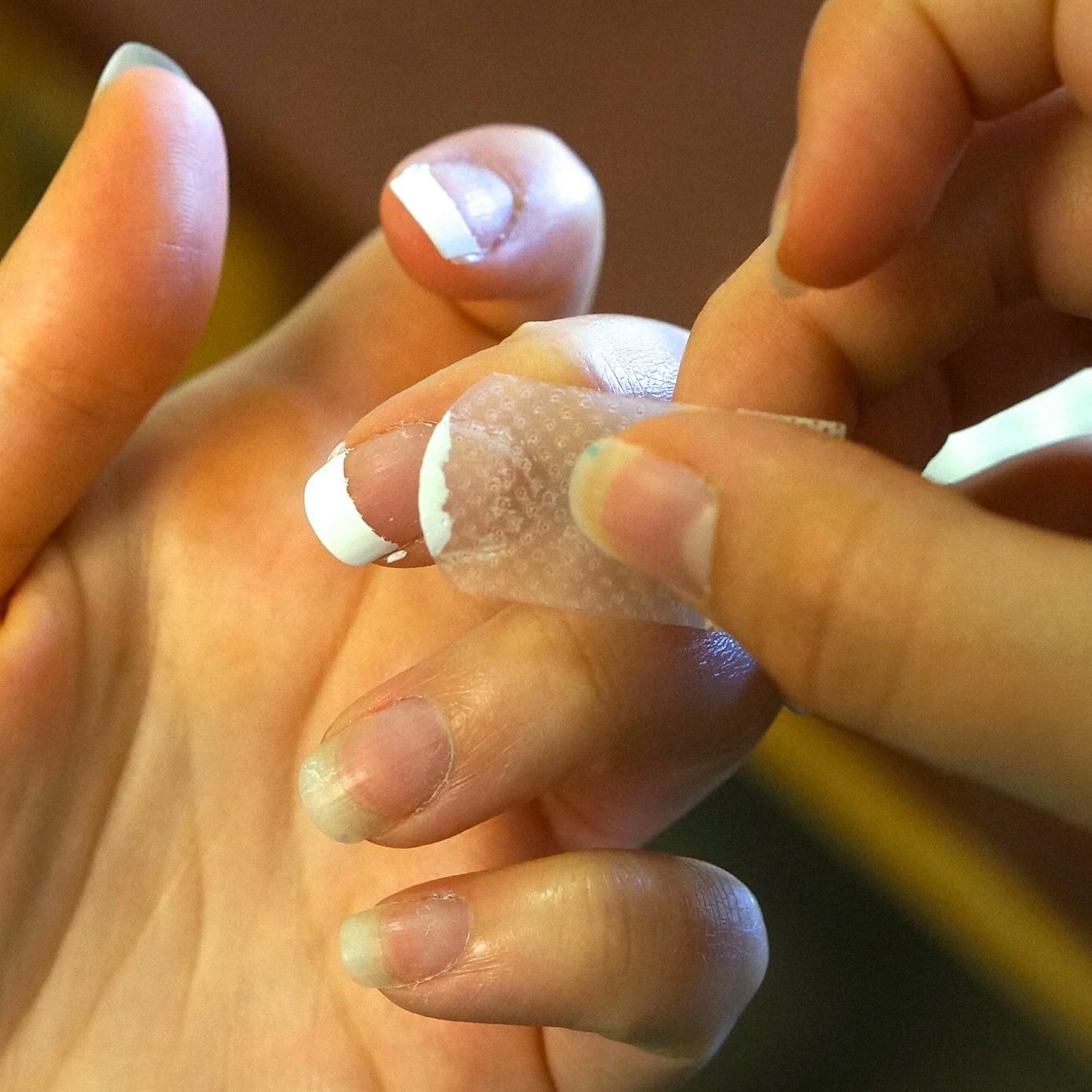 Band Aids are a great help for getting a perfect manicure.