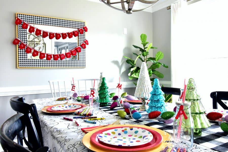 Colorful plates and bright trees will complement the look. Source: Kate Decorates