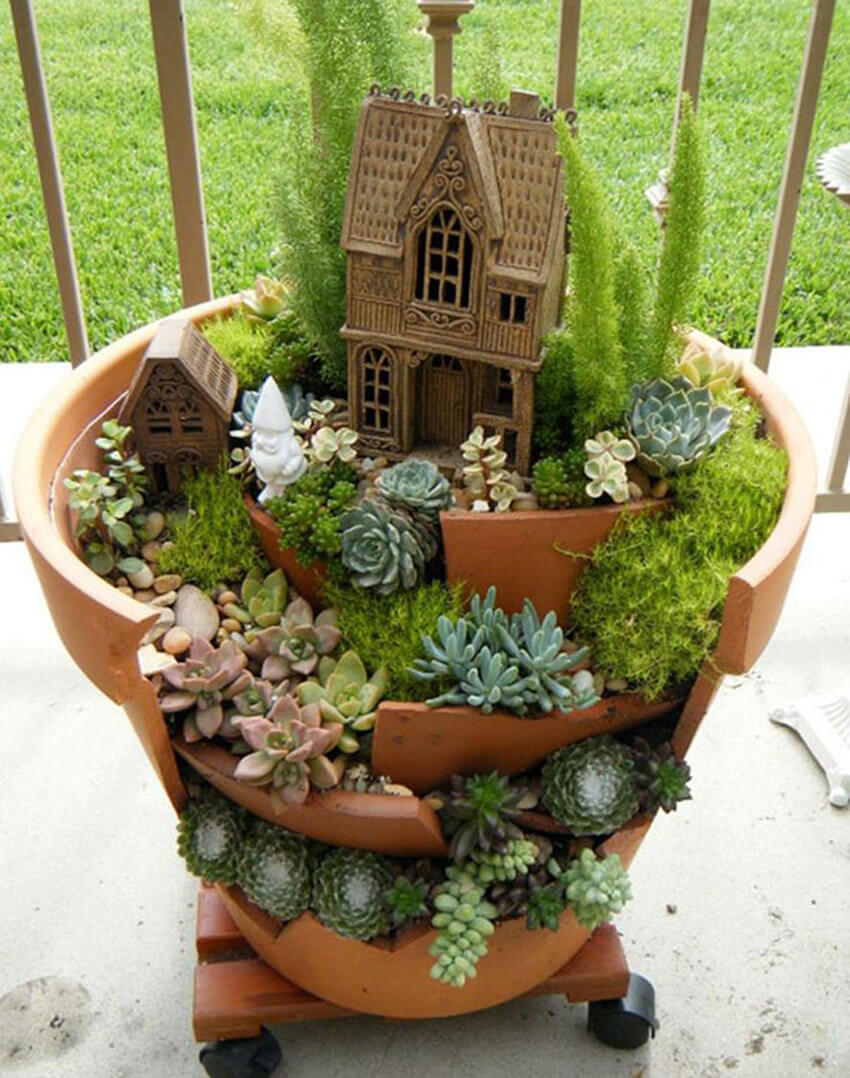 Broken pots can be turned into charming fairy gardens!