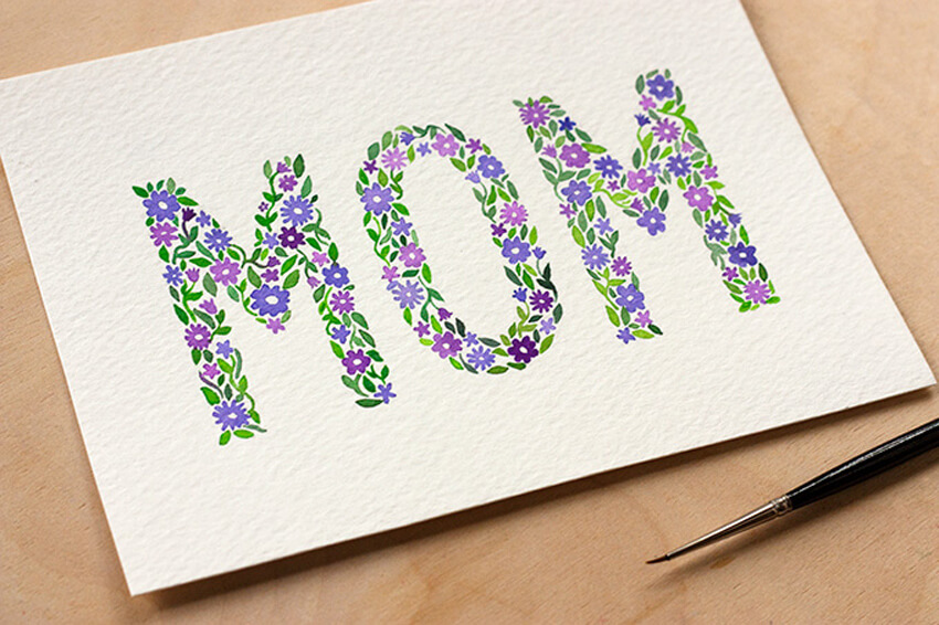 Use watercolors to make your mom a special card.