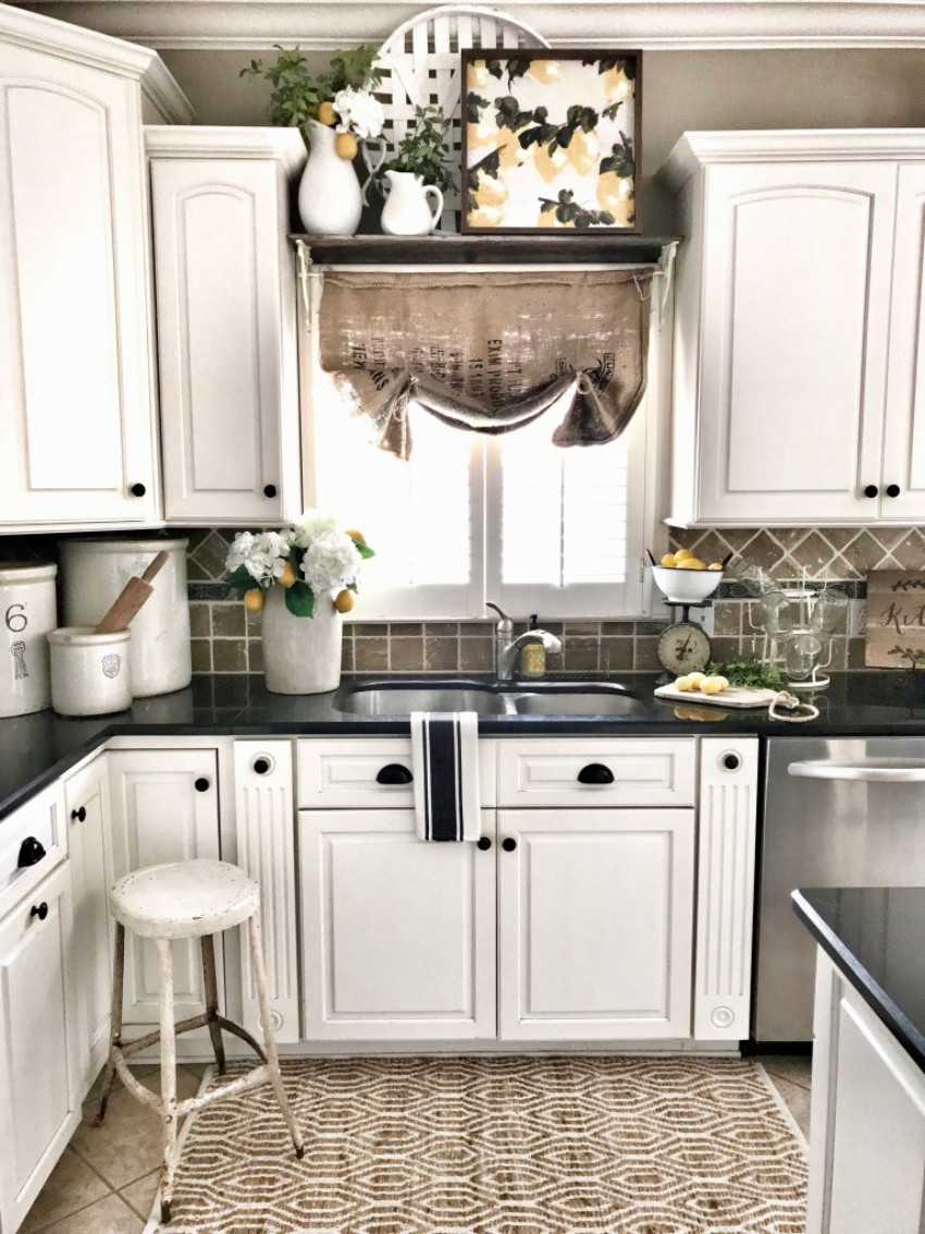 Even a neutral backsplash can take part in a farmhouse-style kitchen. Source: Bless This Nest 