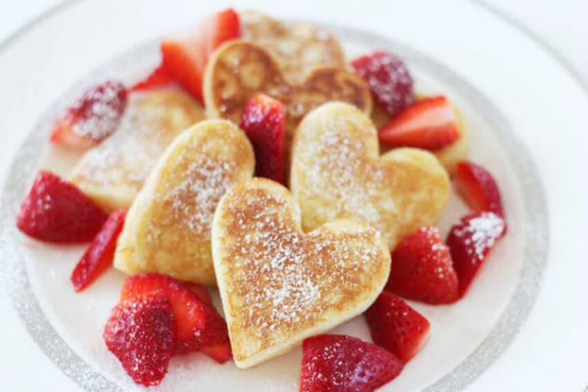 Along with heart-shaped bacon, these heart pancakes make the perfect breakfast!