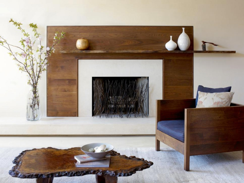 Wood can revamp your fireplace and make it look rustic! Source: Decor Aid