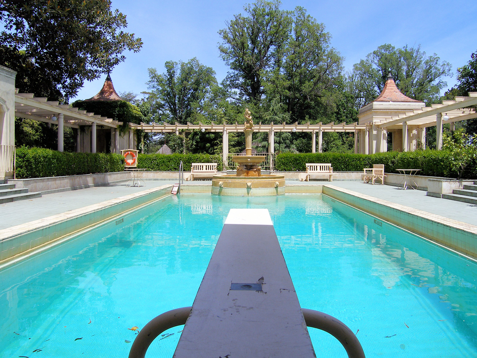 Diving board pool features make everything more fun! Even walking the plank!