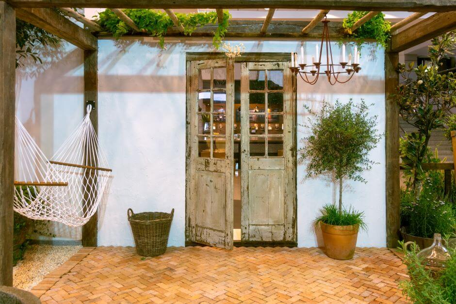 Create cozy nook under deck